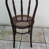Old caned bistro chair fischel
