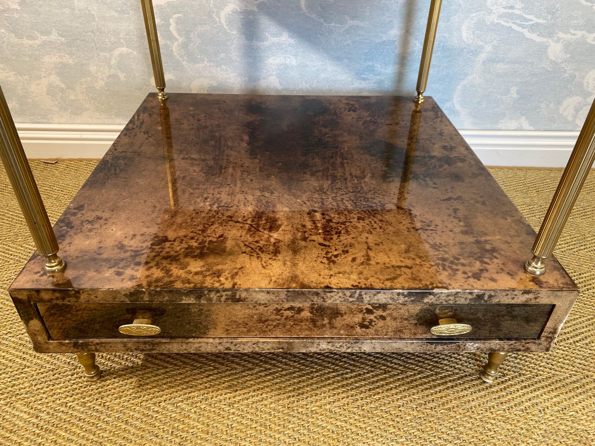 Aldo Tura side table in hazel brown tones with brass legs and bottom drawer