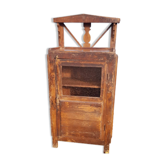 Glass-fronted entrance cabinet in Burmese teak