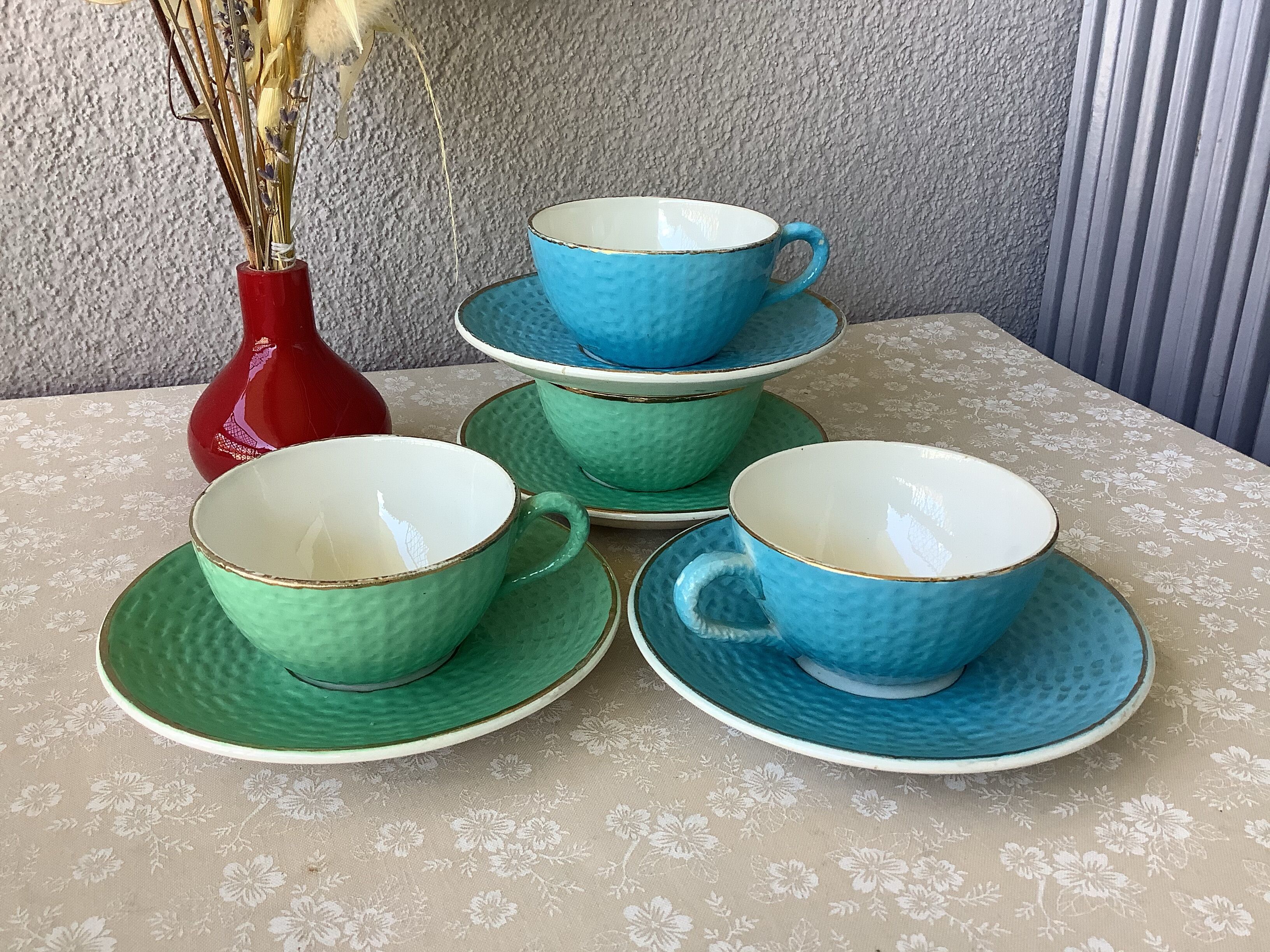 Multicolored Digoin cups looking basket weaving