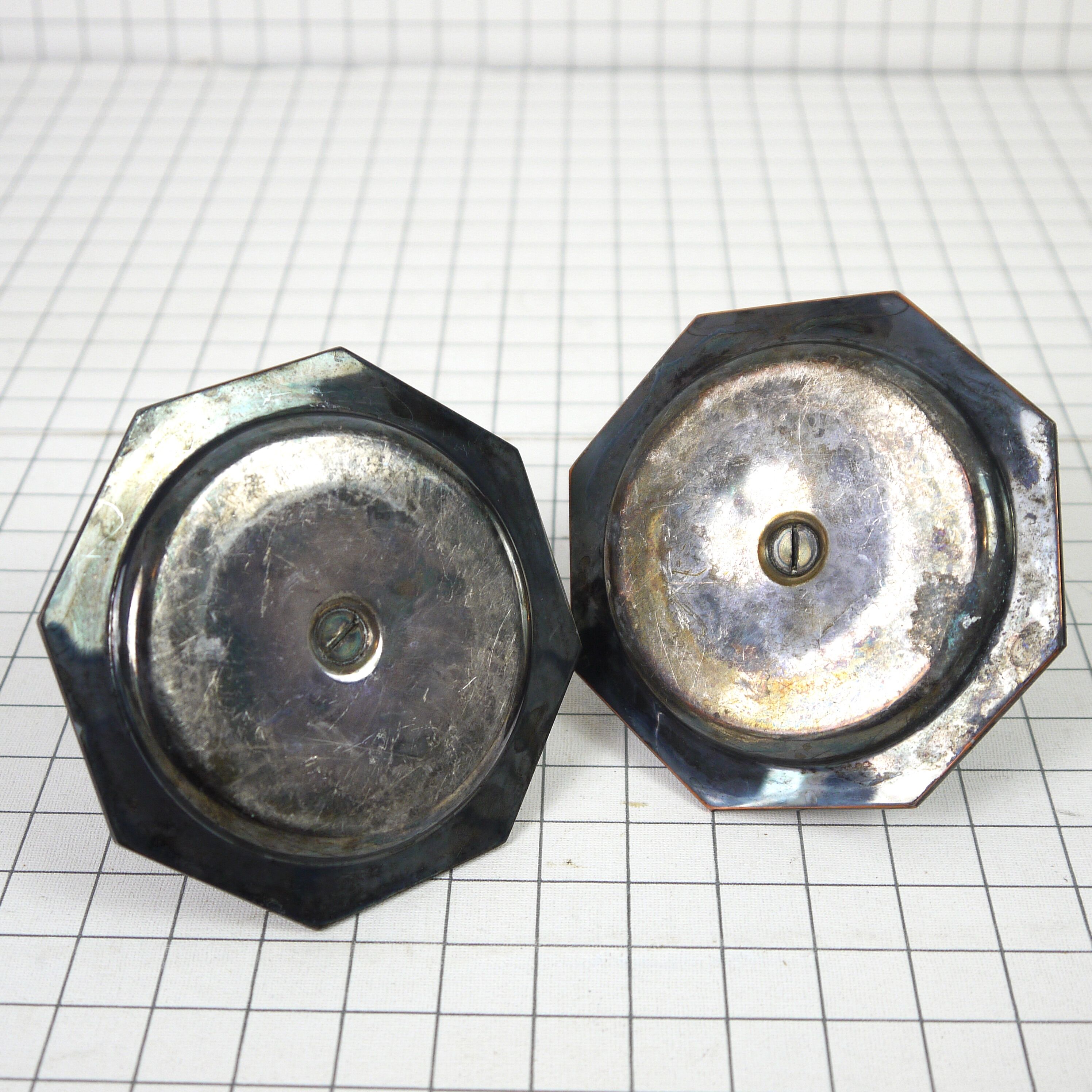 Pair of metal candlesticks