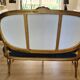 Antique Louis XVI style salon in gilded wood, with medallion backs.