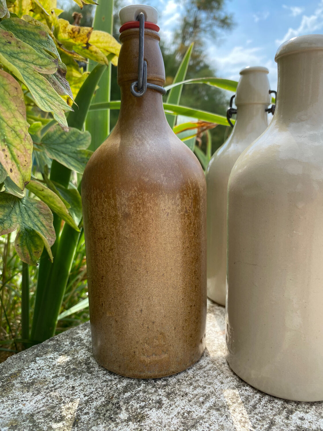 Four stoneware bottles