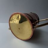 Ancient copper watering can
