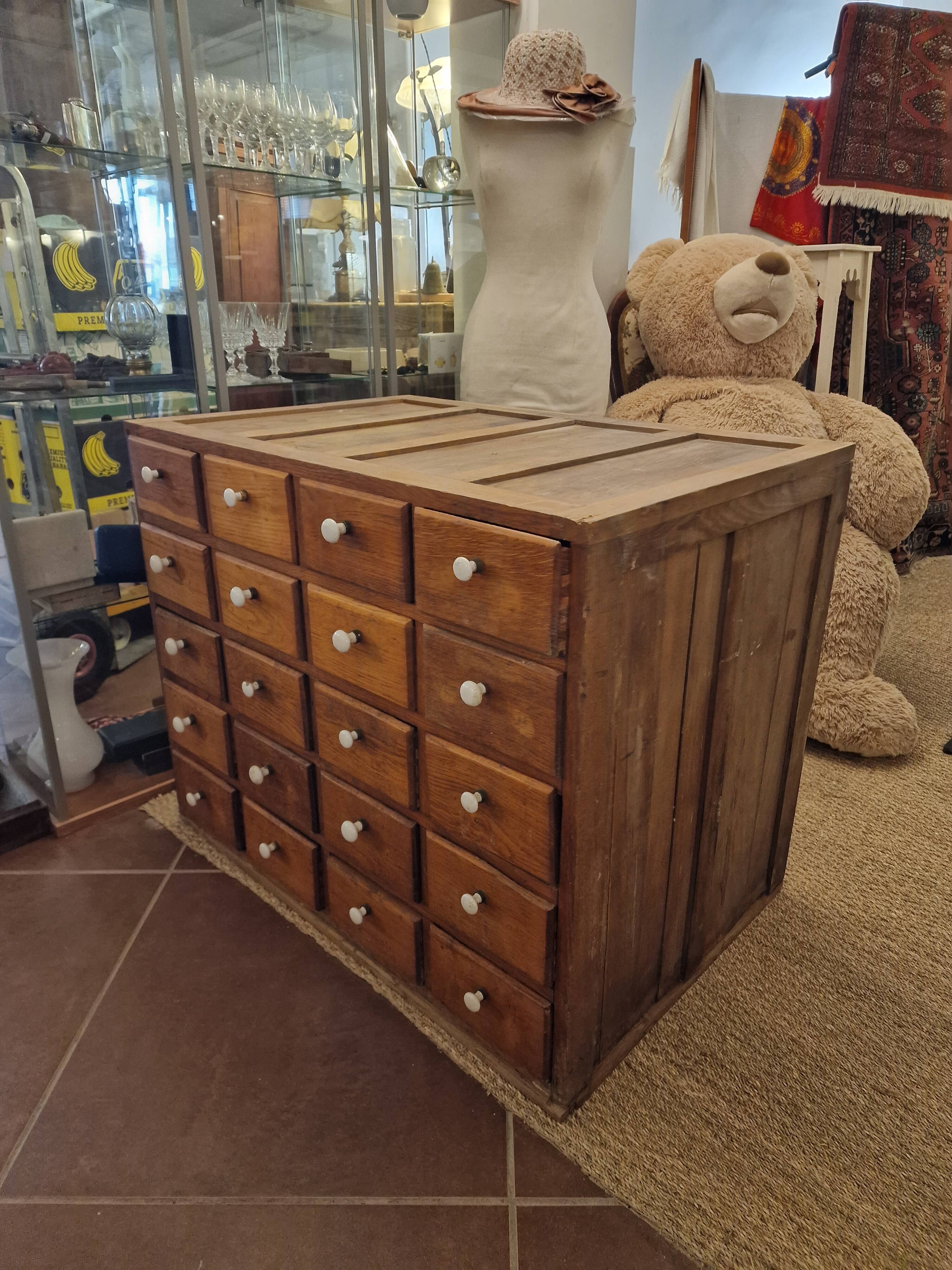Antique craft cabinet with solid oak drawers and porcelain handles