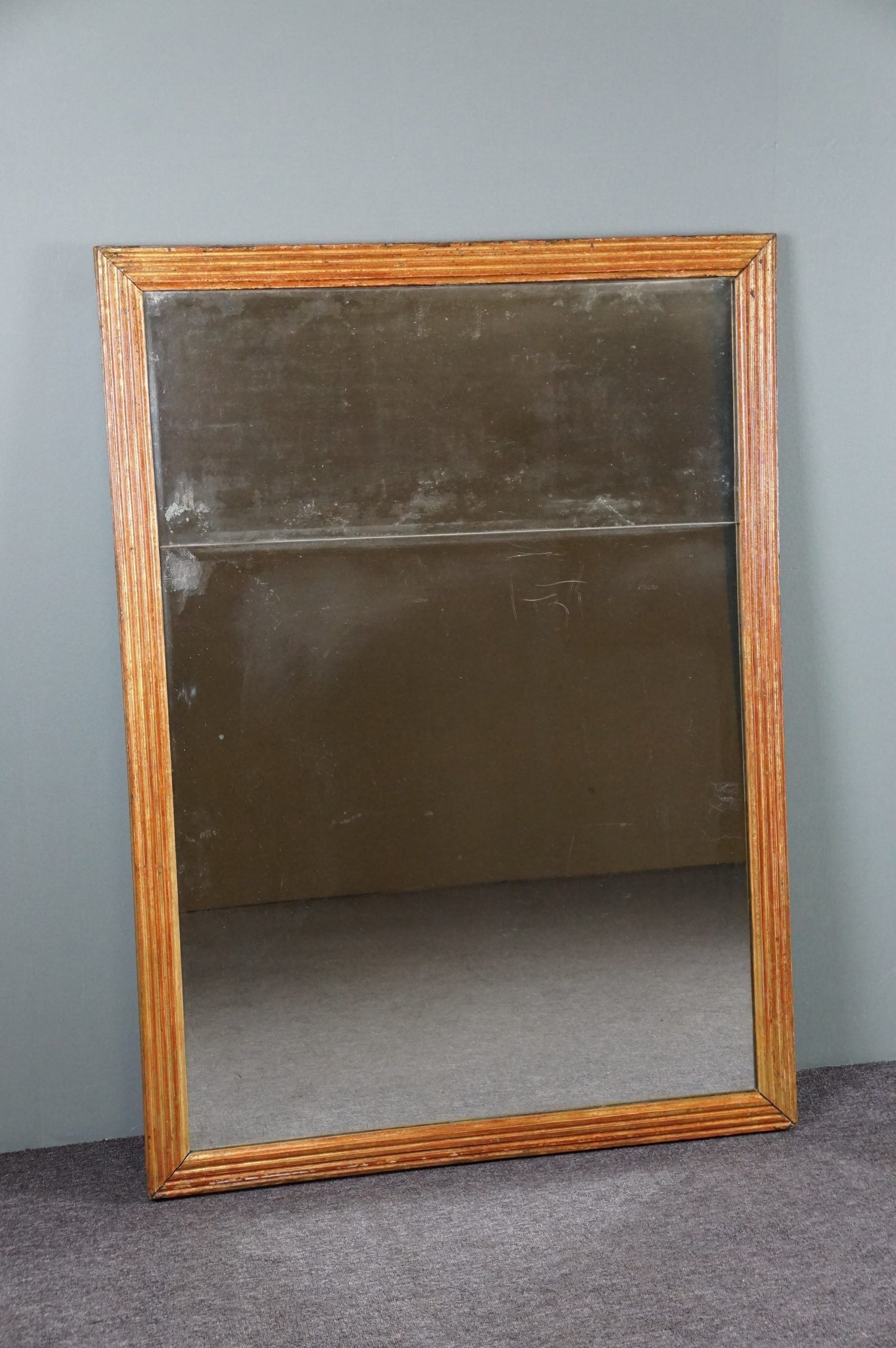 Patinated golden fireplace mirror eighteenth century 123 x 91.5 cm