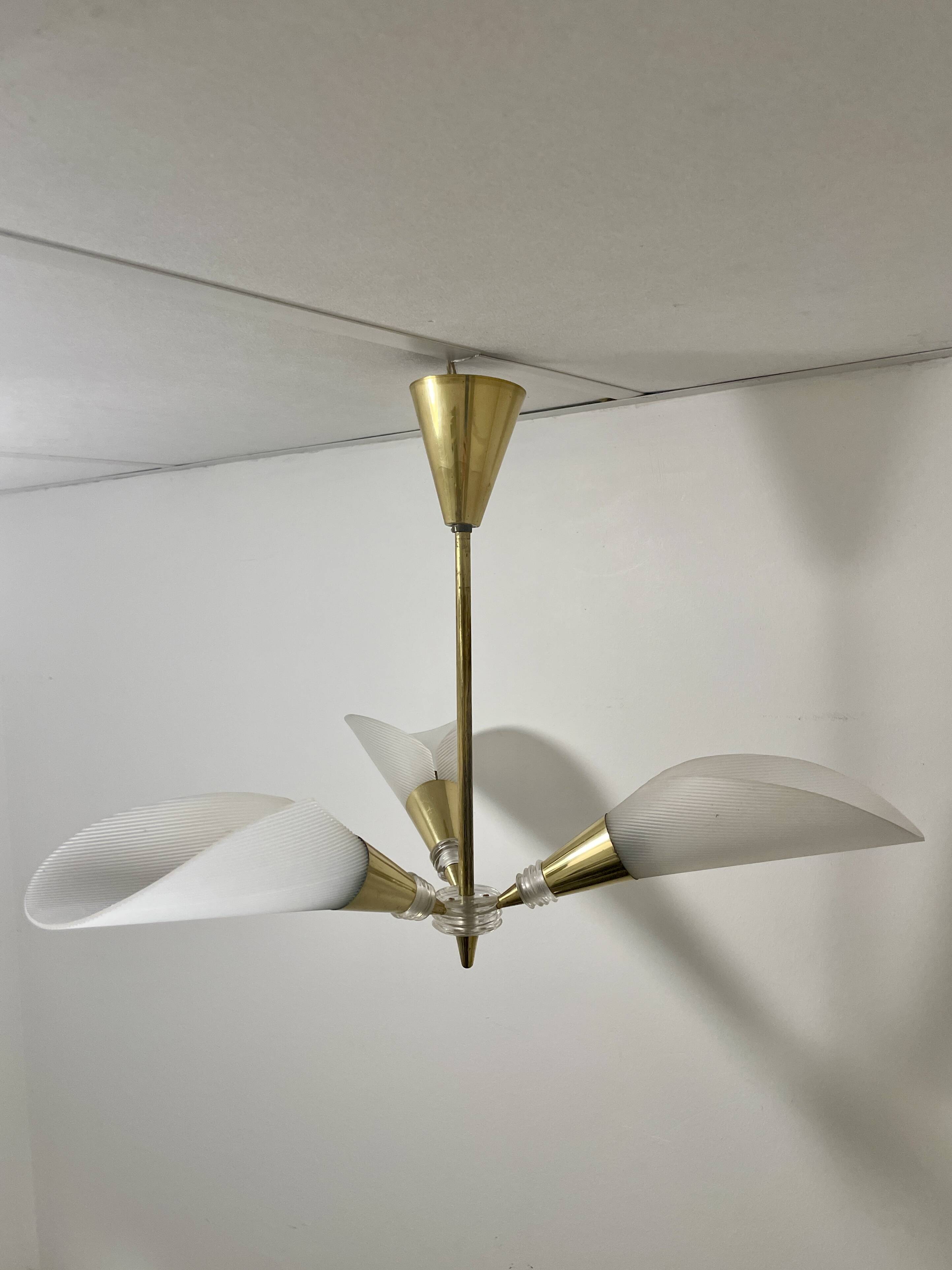 Vintage chandelier with plexiglass and brass cones