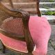 Louis XV style walnut and cane armchair