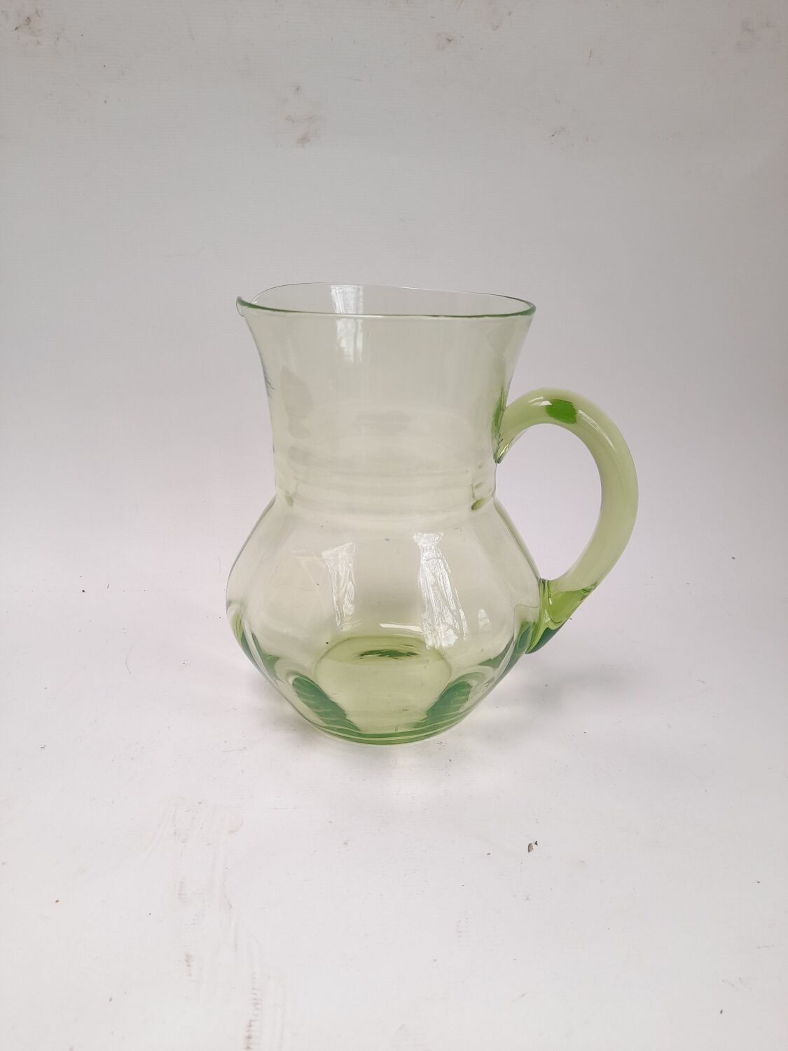 Art Deco carafe in pistachio green glass