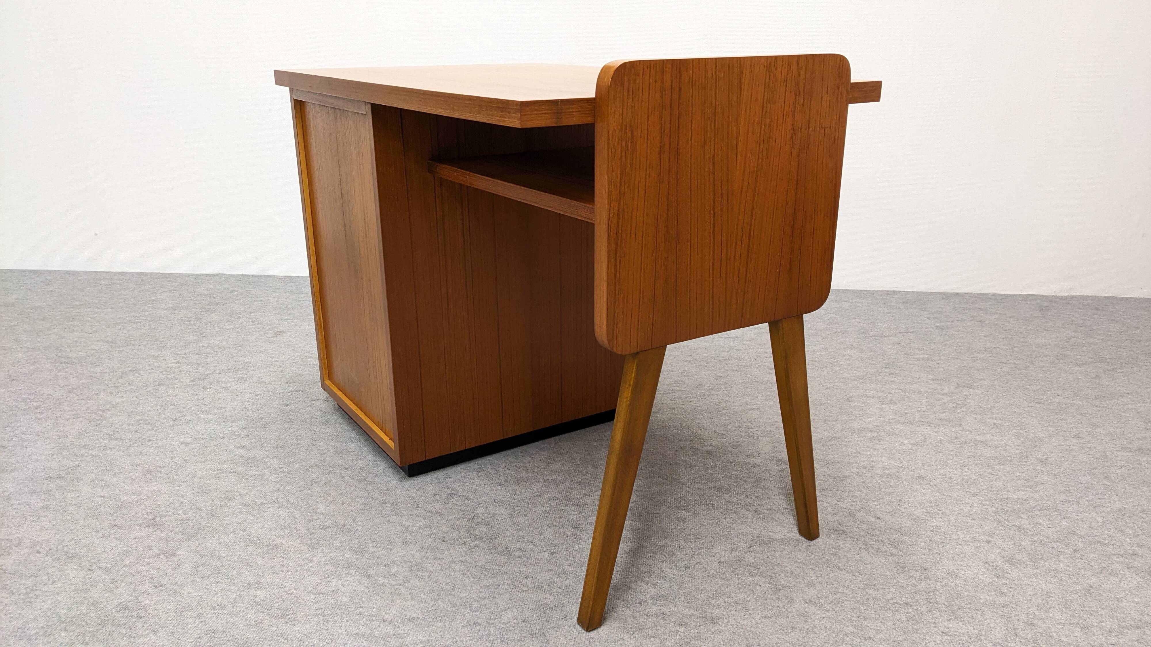 Modernist desk in blonde rosewood, France circa 1960.