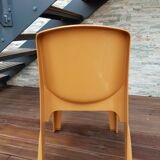 Vintage designer chair in molded plastic