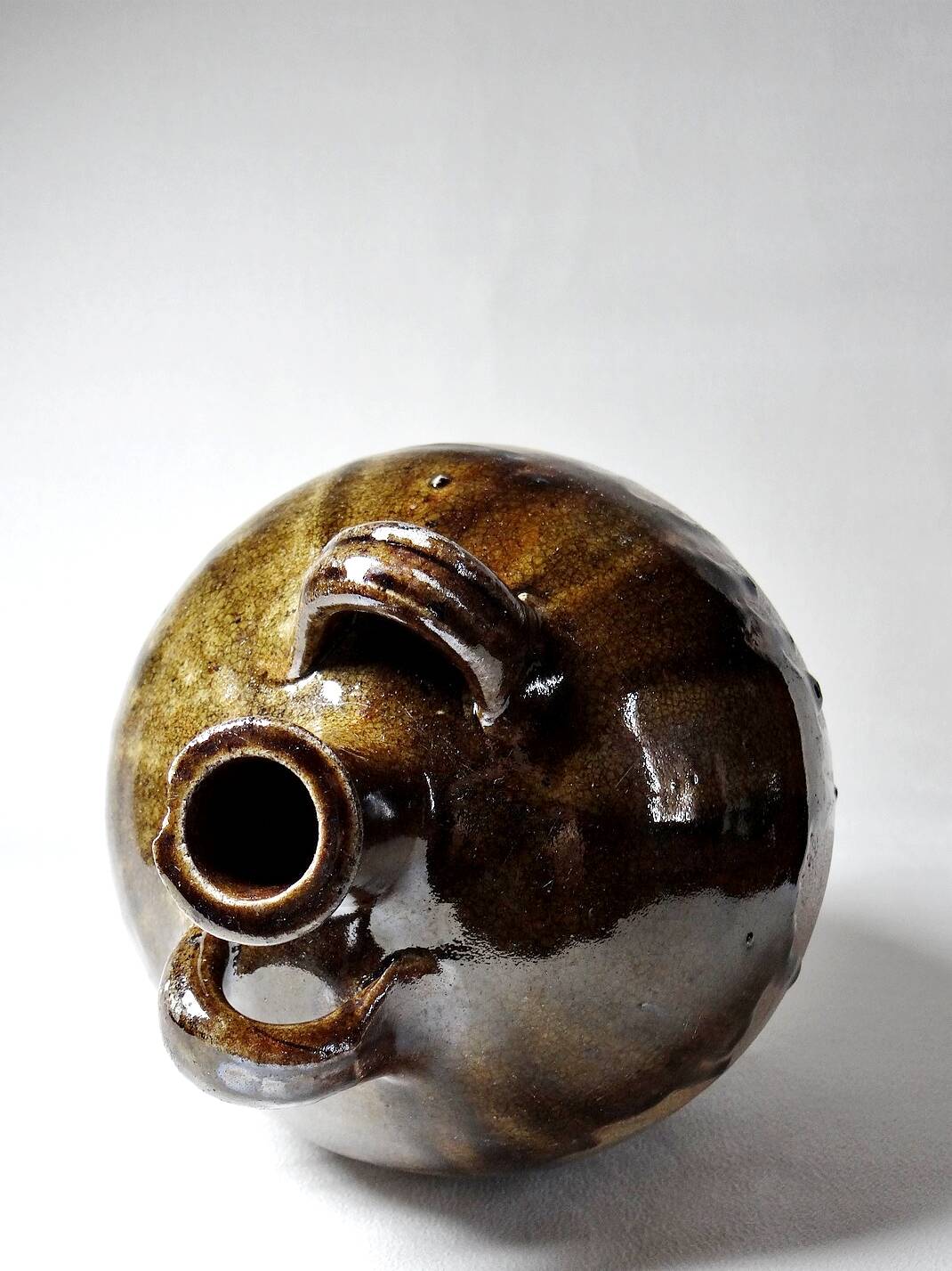 Old stoneware oil jar, glazed and enamelled, 2 handles