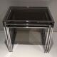 Suite de 3 tables gigognes chromées. Vers 1970