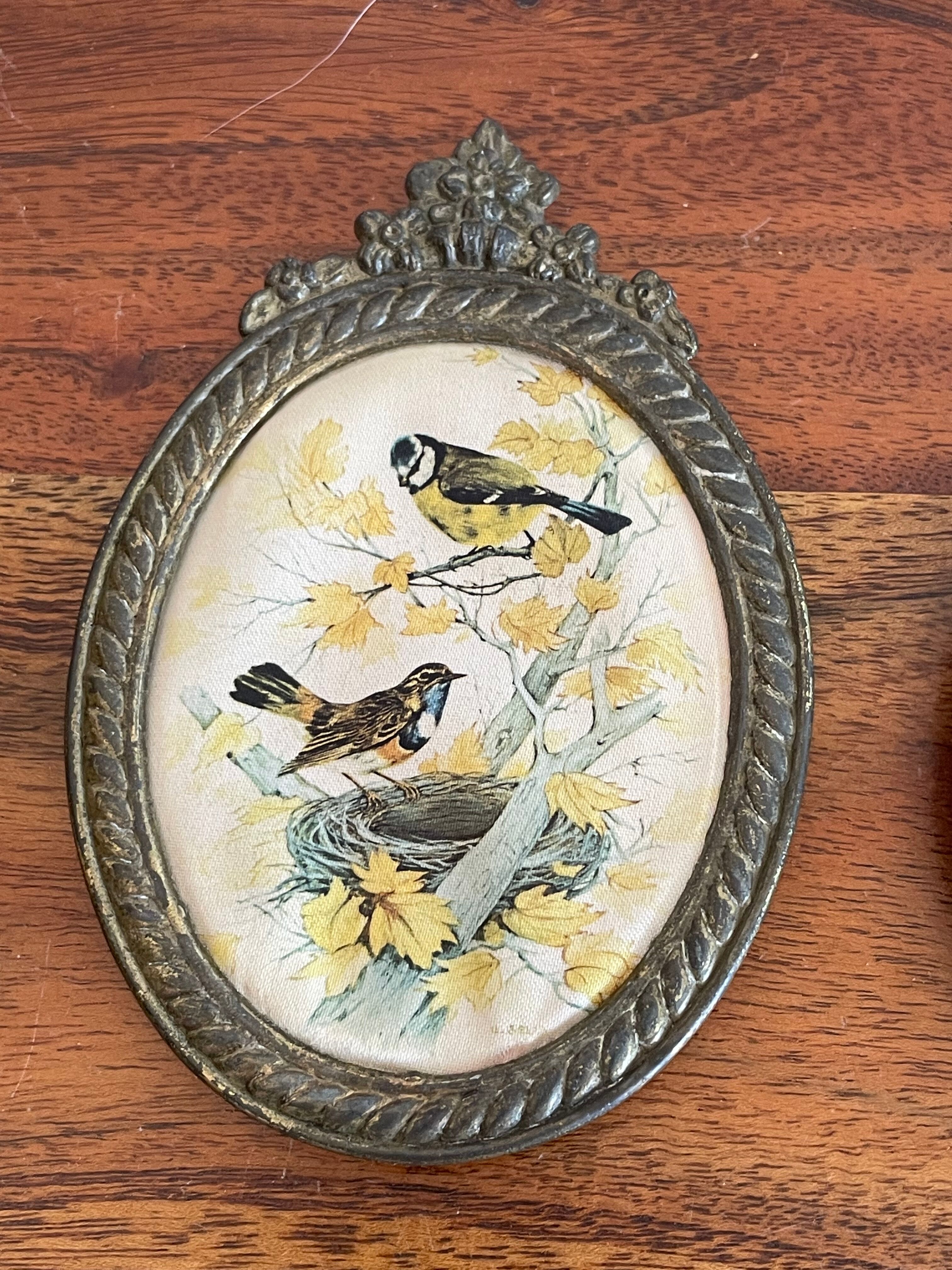 2 oval frames birds on silk