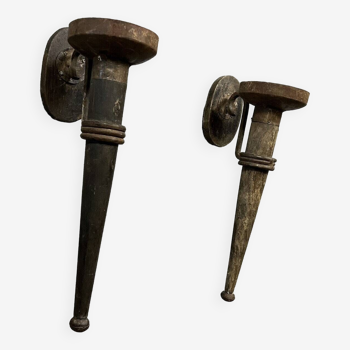 Pair of medieval style iron torchiere sconces from the 19th century