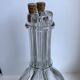 Liquor decanter with molded glass compartments early XXth