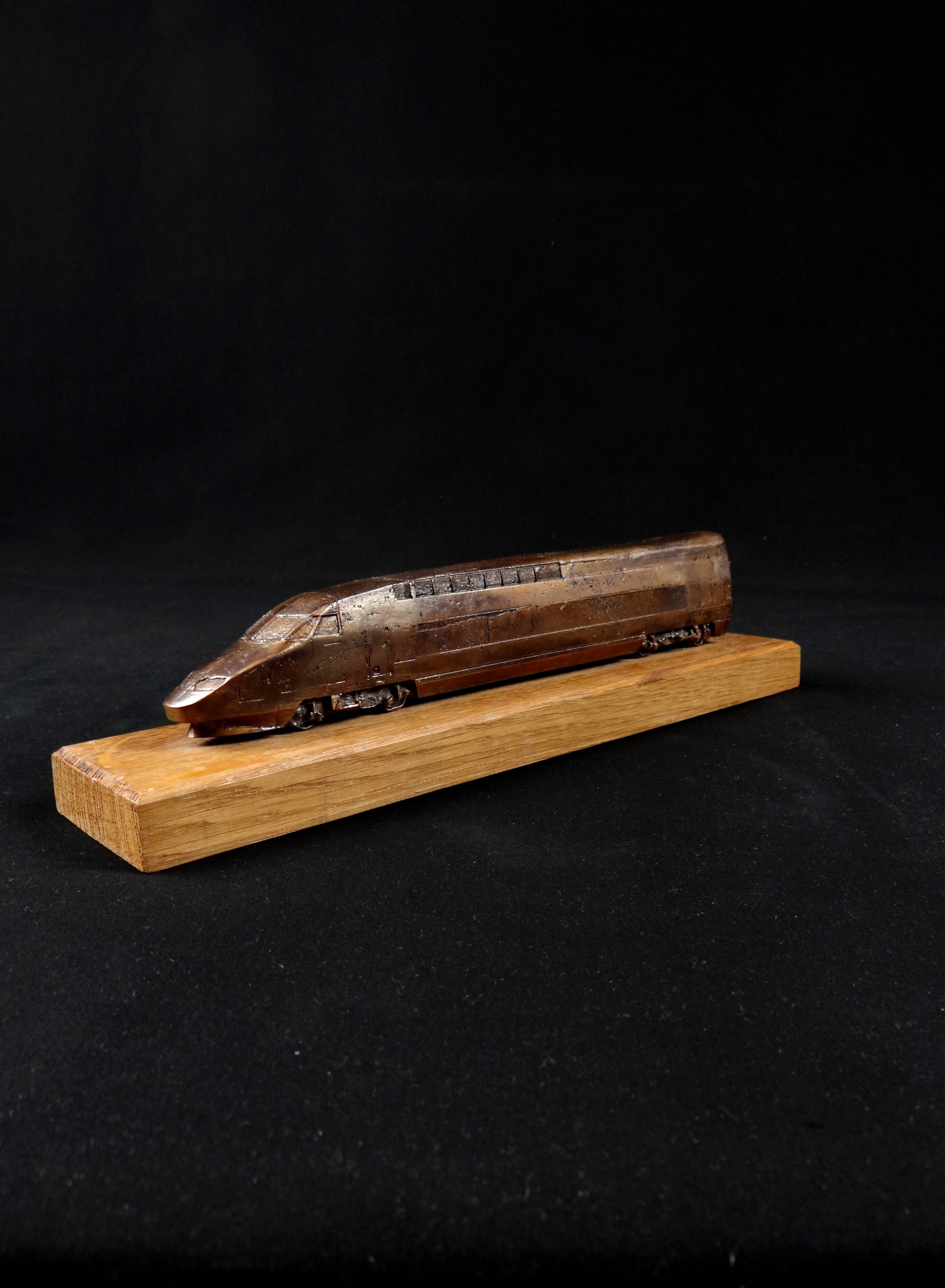 Bronze TGV on a wooden base, scale model of the TGV Sud-Est from the 1980s