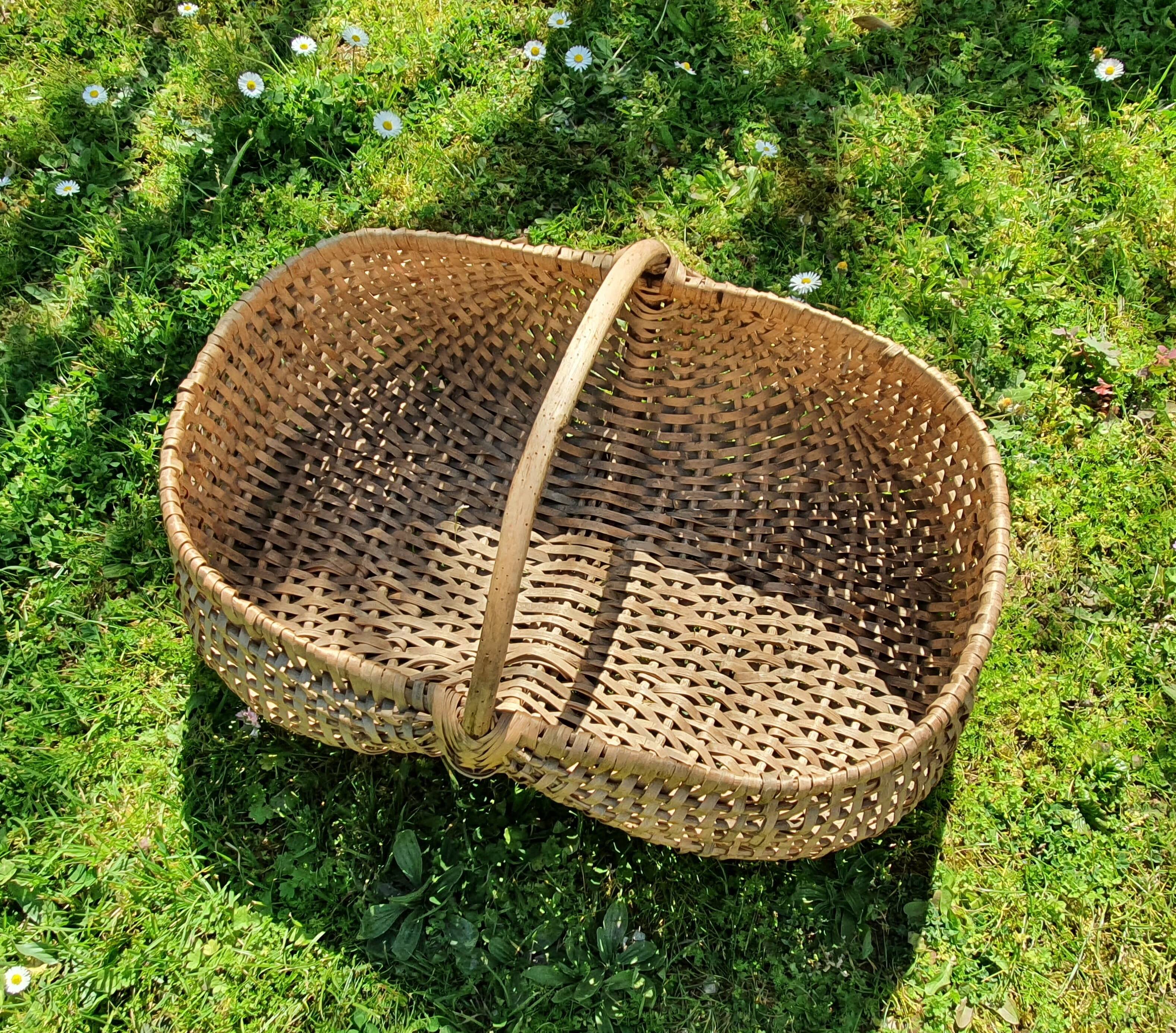 Burgundy basket in braided wicker