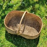 Burgundy basket in braided wicker