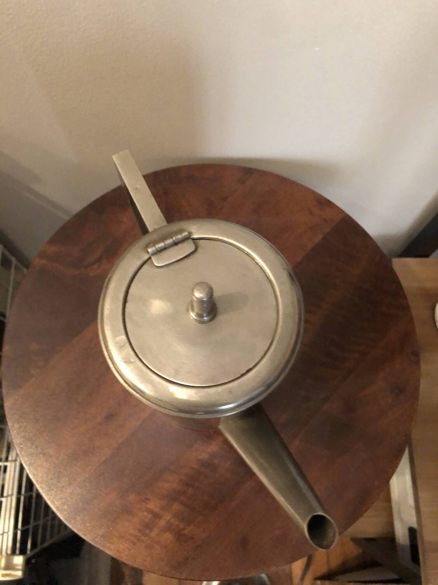 Stainless steel teapot in Art Deco style