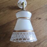 Apply brass swan collar and glass graphic patterns