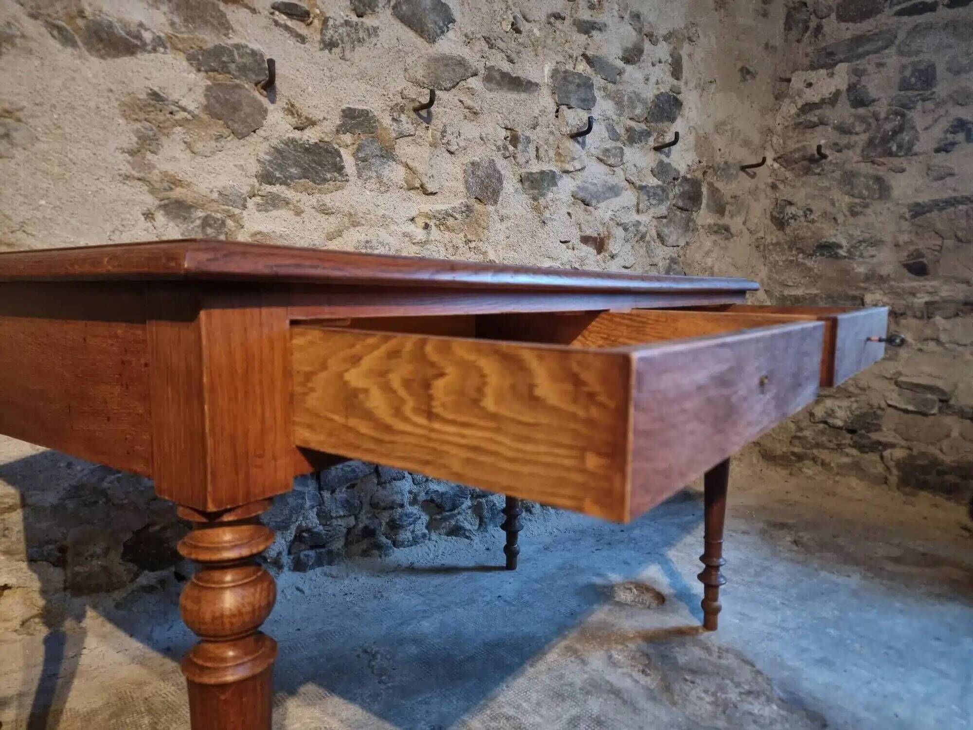 Antique French writing desk in oak with two drawers, 1920s.