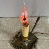Candle holder with 20th century spelter socket mounted as a flame bulb lamp