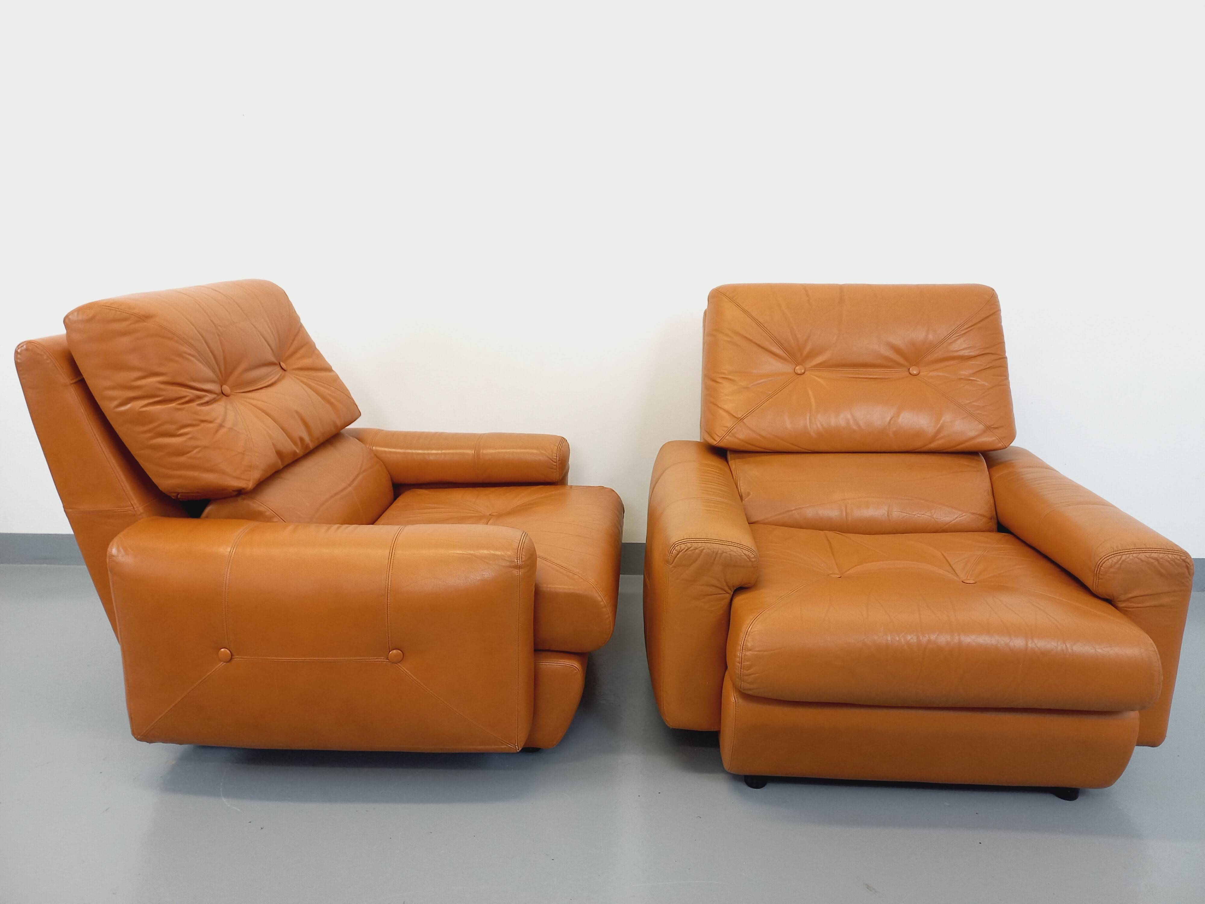 Pair of vintage leather lounge chairs from the 60s and 70s