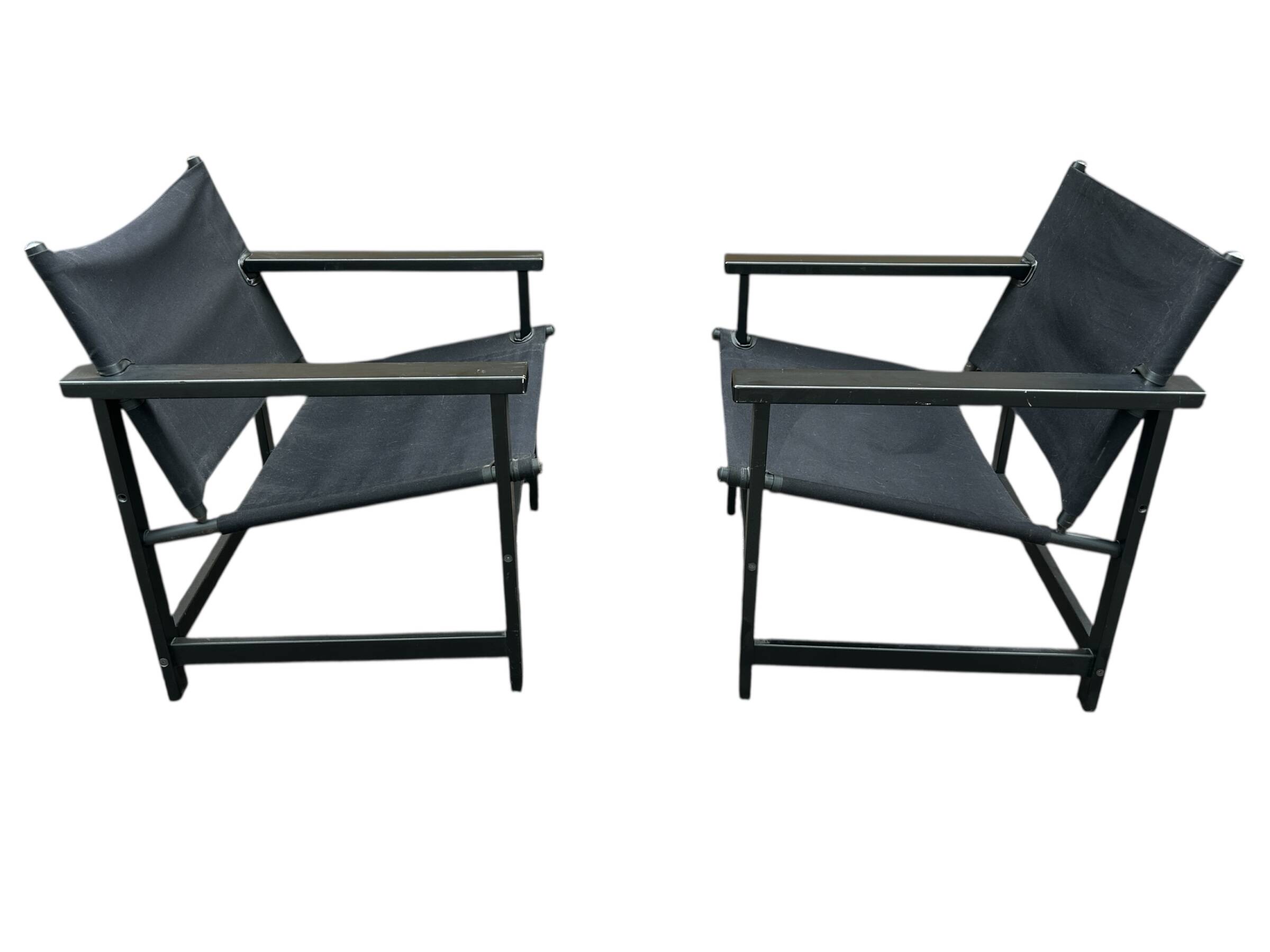 pair of Hyllinge Møbler safari armchairs