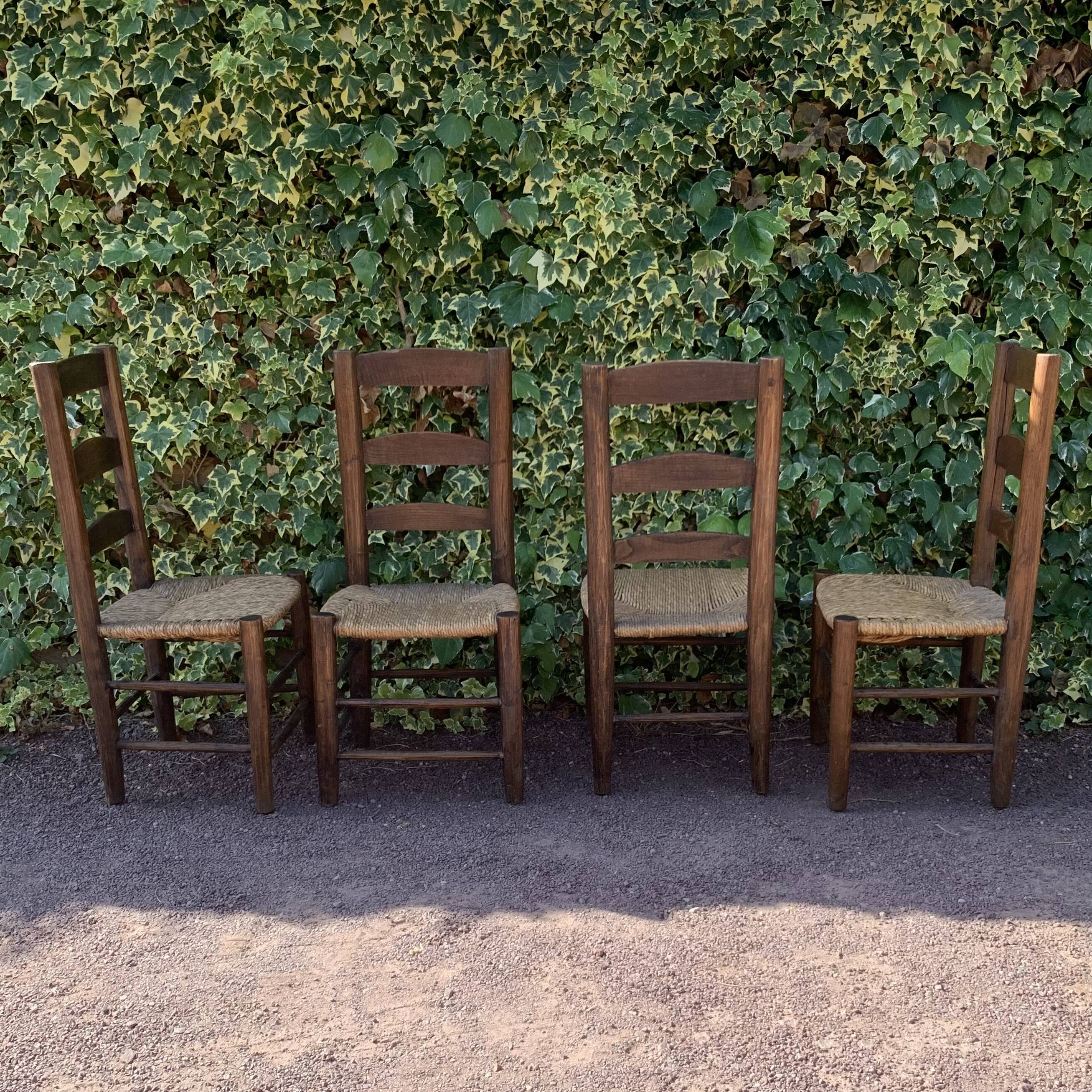 Set of 4 handcrafted rush chairs in solid oak.