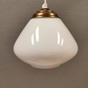 Beautiful ball-shaped hanging lamp in white opal glass with brass top.