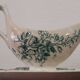 Gravy boat with white and green earthenware handle