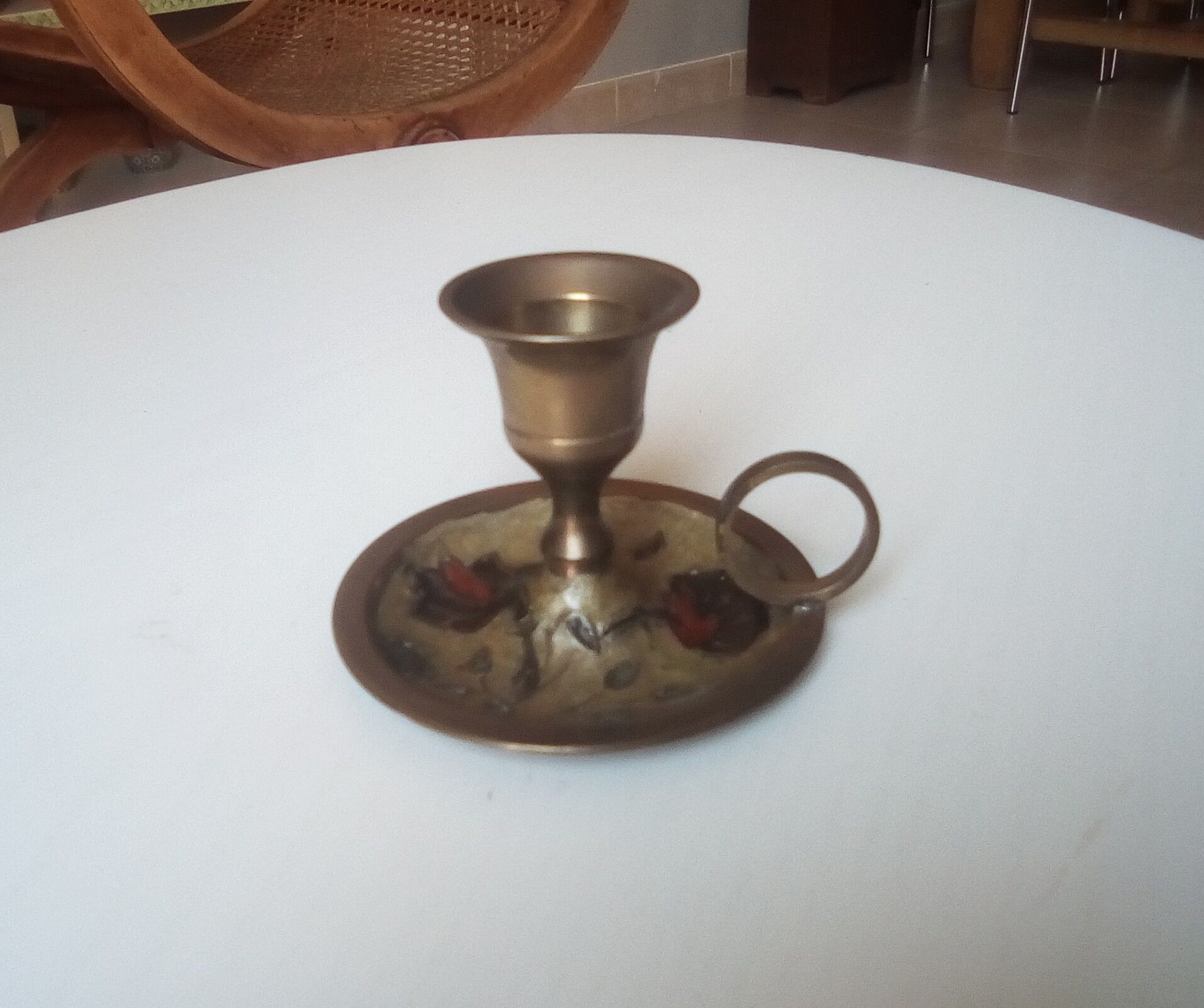 Vintage candlestick in brass cellar rat