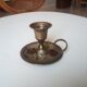Vintage candlestick in brass cellar rat