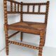 A wooden corner chair turned 1920s
