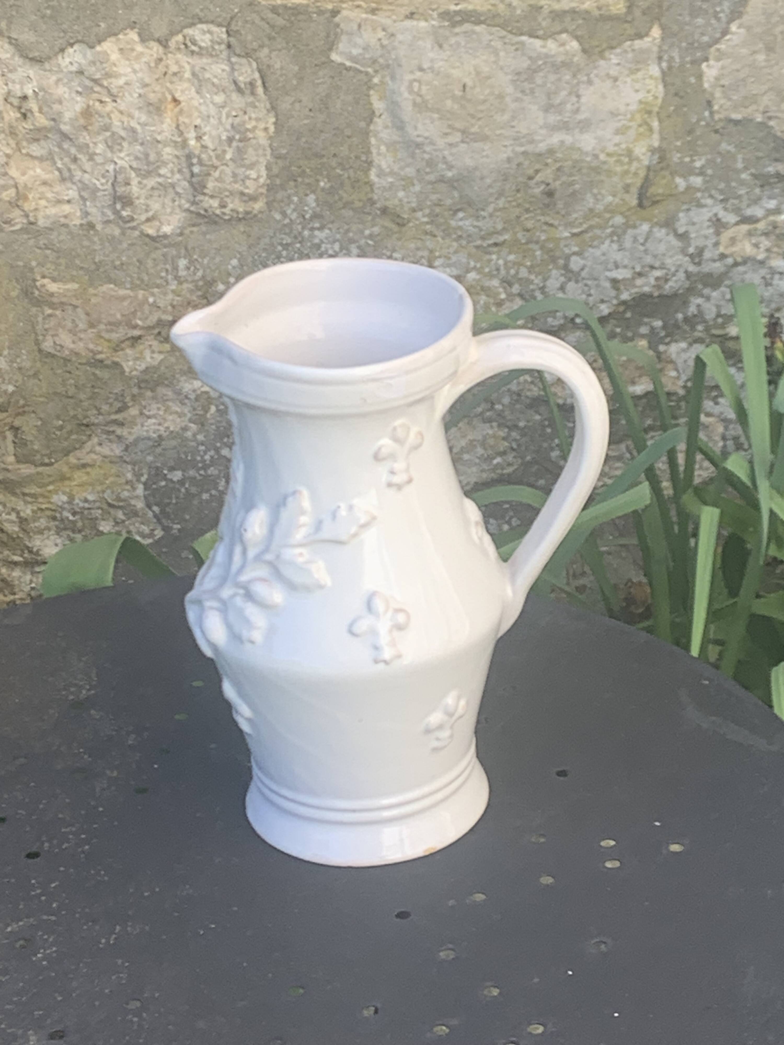 Carafe, pitcher signed Émile Tessier, Old France, in slip, ceramic