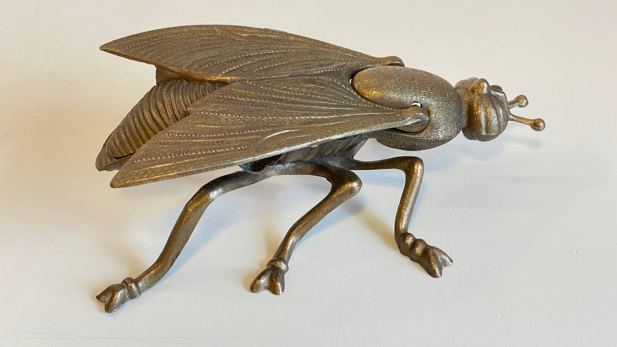 Vintage fly ashtray in patinated metal