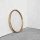 Oval mirror with gilded wood from the 1960s.