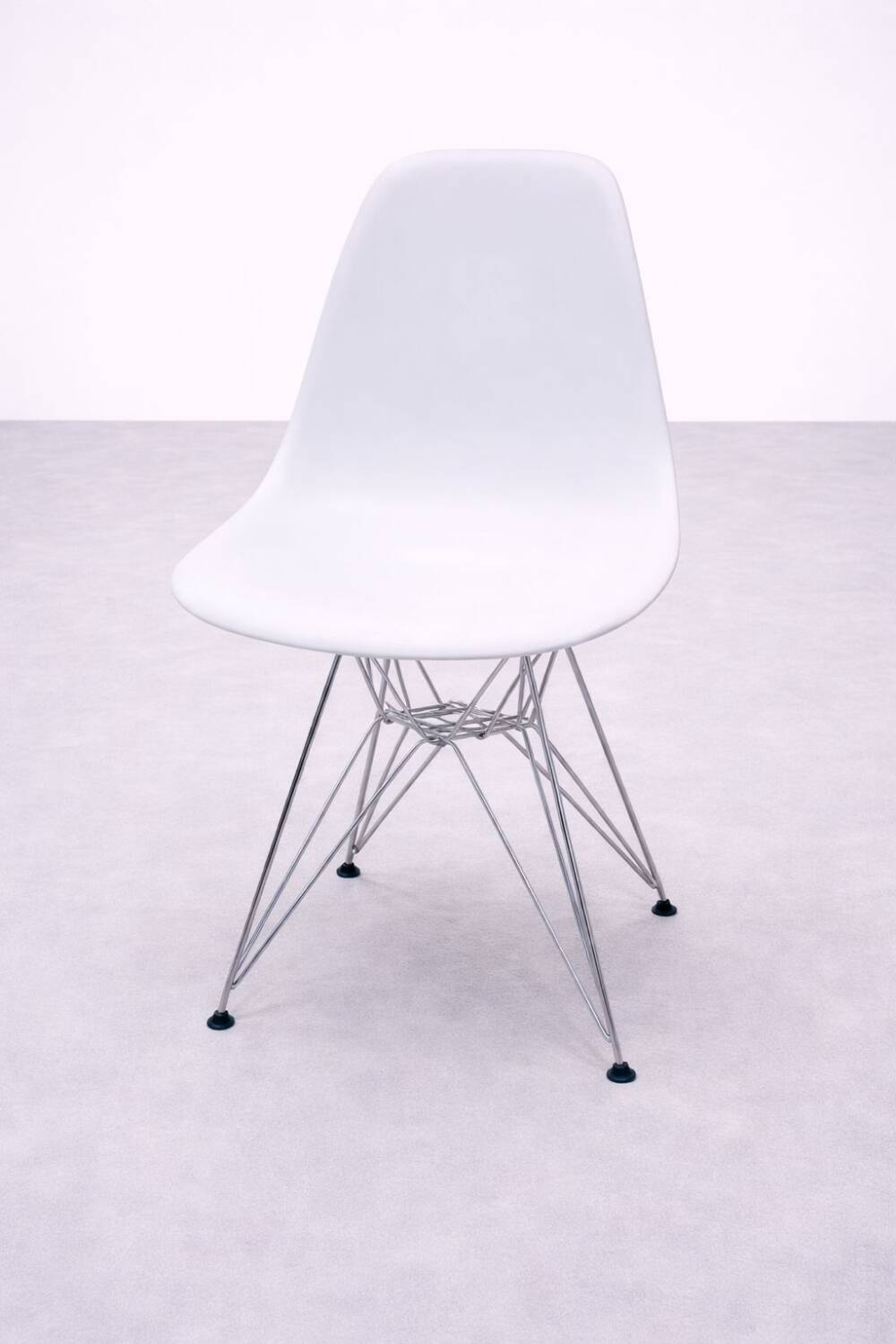 White DSR style Eames chair by Vitra with chrome Eiffel base.