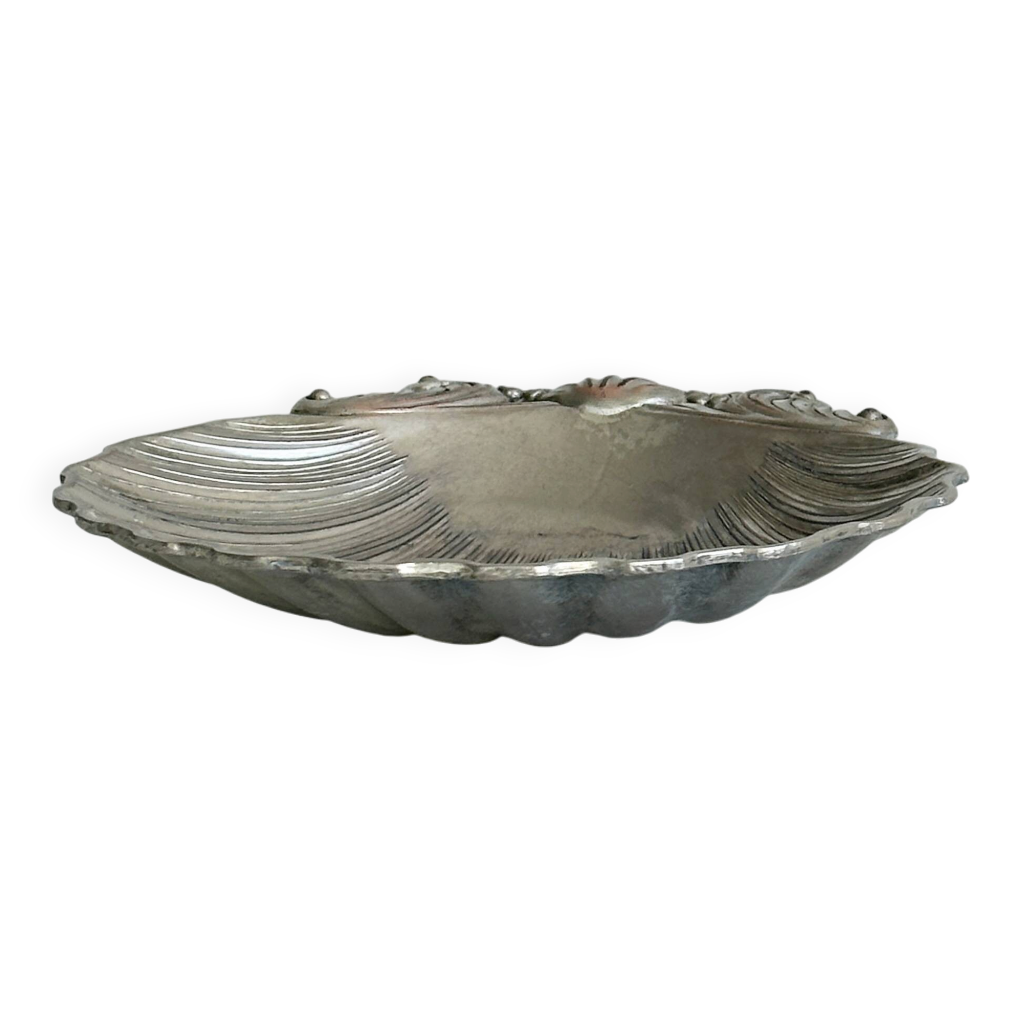 shell-shaped metal pocket tray with patina