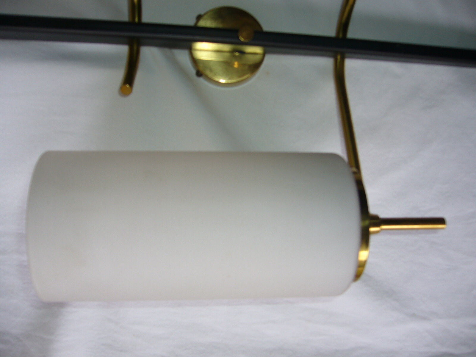 Black and gold metal sconces, Arlus house opalin lenses from the 1950s