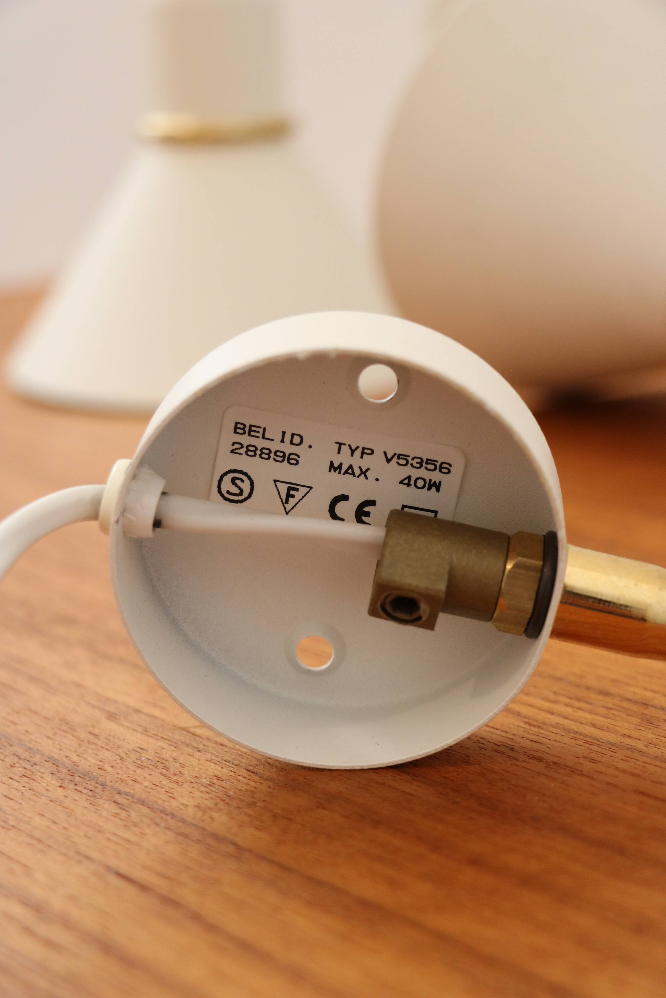 Pair of Scandinavian wall lights, white and gold metal