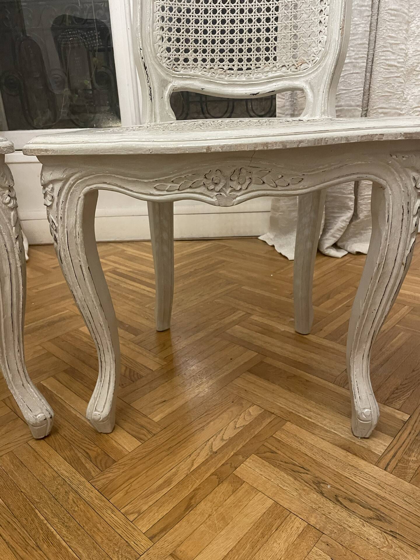 Set of 4 white caned chairs in Louis XV style.