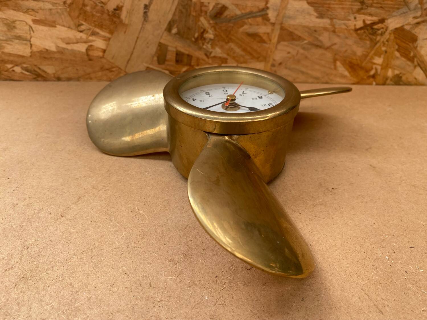 Antique brass propeller with pendulum vintage nautical wall clock