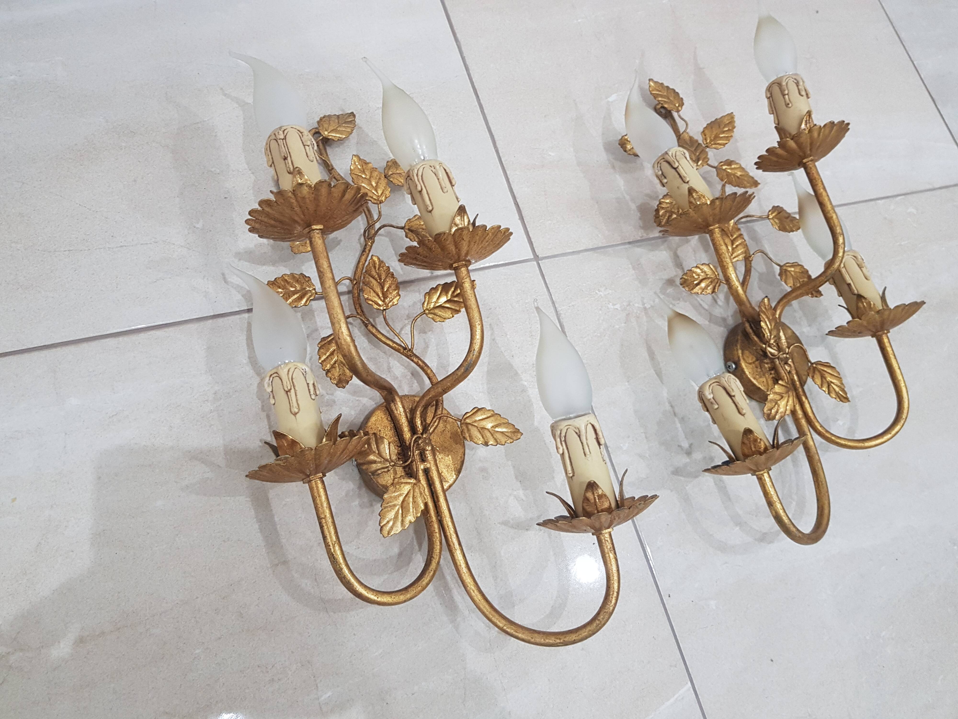 A pair of wall lamps / Coco Chanel / Hollywood Regency / France, 1960s