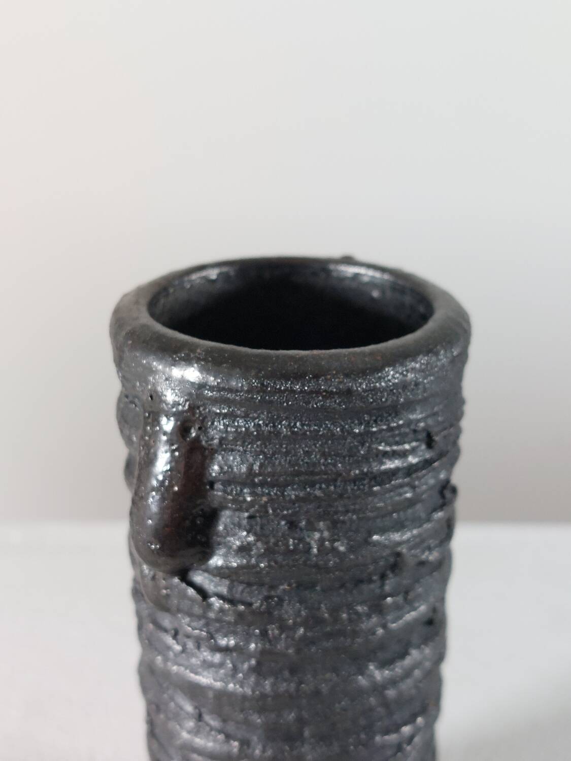 Small vintage brutalist vase with oxidised glaze from the 1950s.