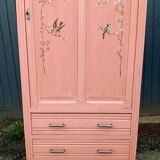 Old pink Parisian cabinet with painted decor