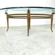 Vintage golden metal and oval glass coffee table, 1970s