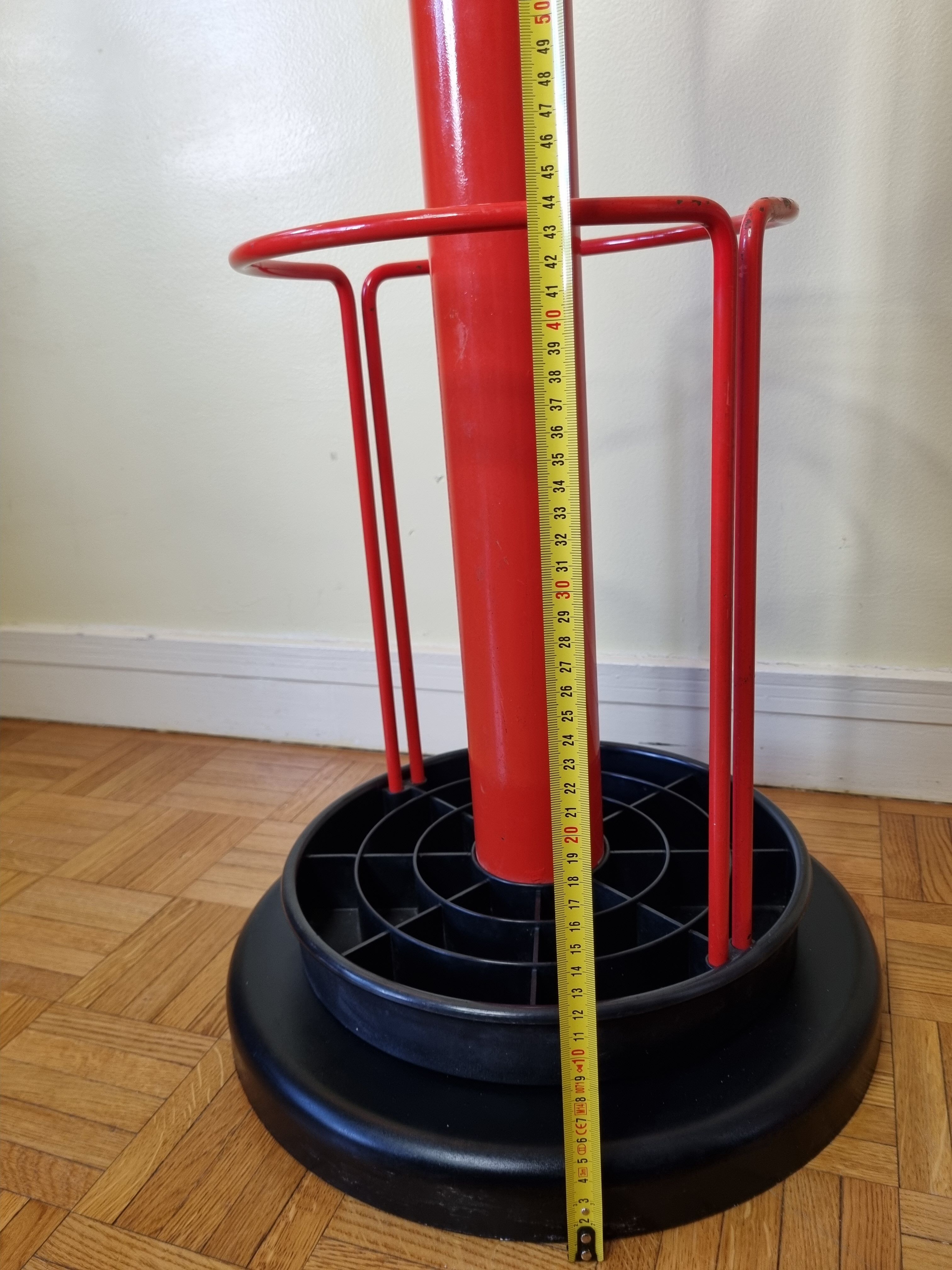 Coat rack in orange lacquered metal published by Seccose, 80s