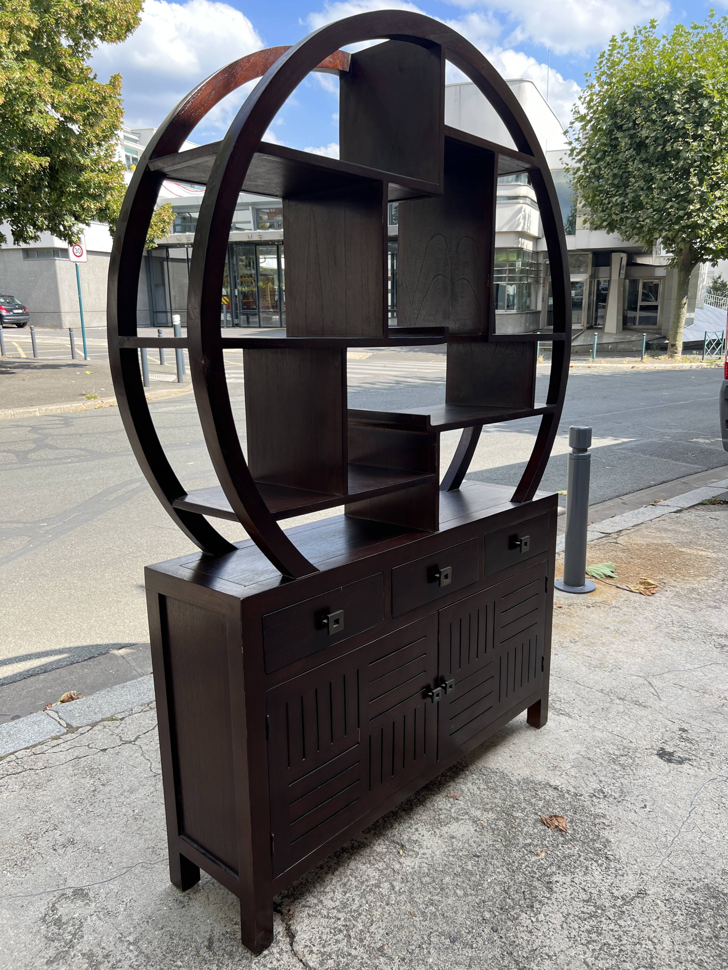 Round galay shelf on bahut sideboard